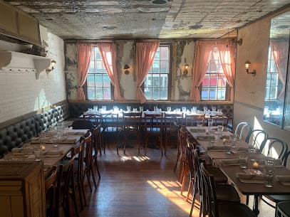 Tiny's & The Bar Upstairs